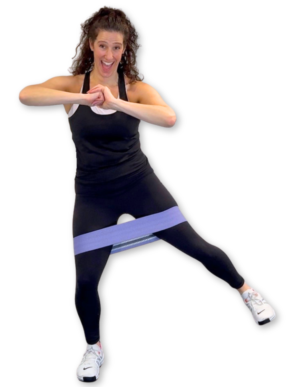 Ro from White Label Workouts demonstrating a band-based fitness movement